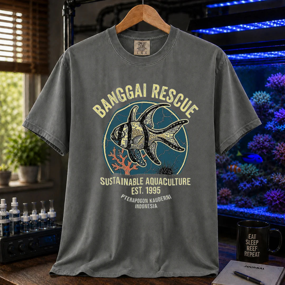 Saltwater aquarium graphic t-shirt featuring a retro emblem of a Banggai Cardinalfish and text: BANGGAI RESCUE, SUSTAINABLE REEFKEEPING, EST. 1995, PTERAPOGON KAUDERNI, INDONESIA, khaki crew neck tee