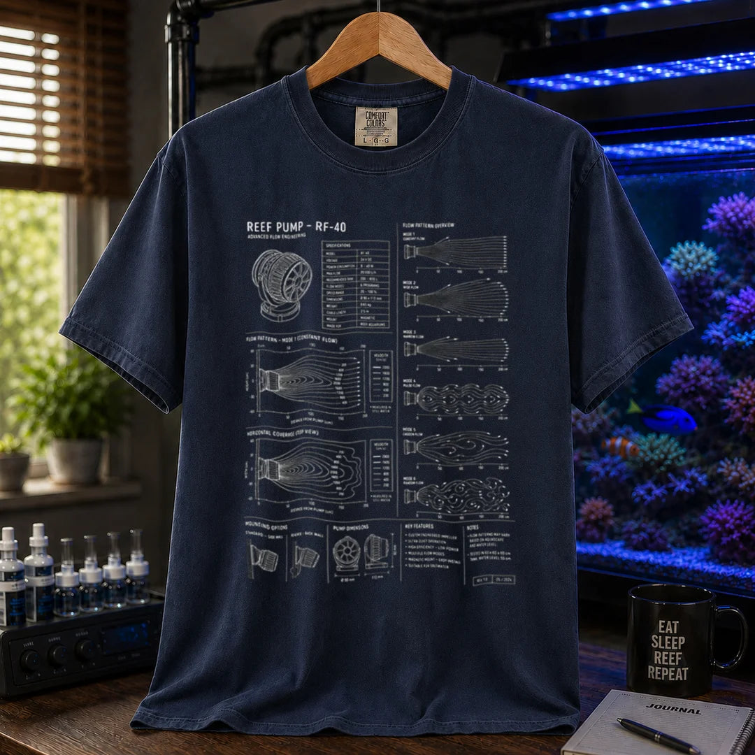 Saltwater aquarium graphic t-shirt on a pure solid white fabric background featuring a technical reef pump blueprint schematic and flow diagrams, navy crew neck tee