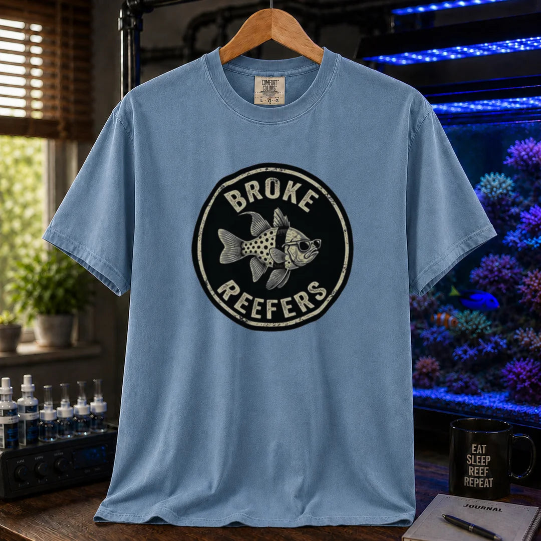 Saltwater aquarium graphic t-shirt featuring the circular Broke Reefers vintage logo with a bespectacled fish illustration, blue crew neck tee