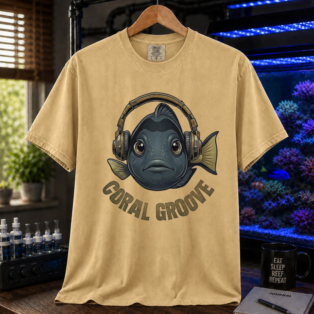 Saltwater aquarium graphic t-shirt featuring a fish wearing headphones and text: CORAL GROOVE, mustard crew neck tee