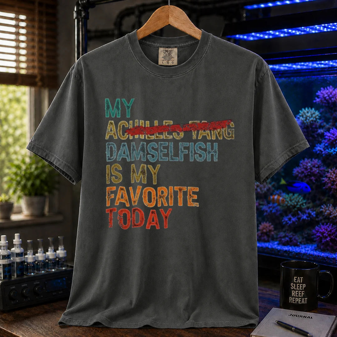 Saltwater aquarium graphic t-shirt featuring retro block text with a crossed-out fish reference: MY DAMSELFISH IS MY FAVORITE TODAY, grey crew neck tee