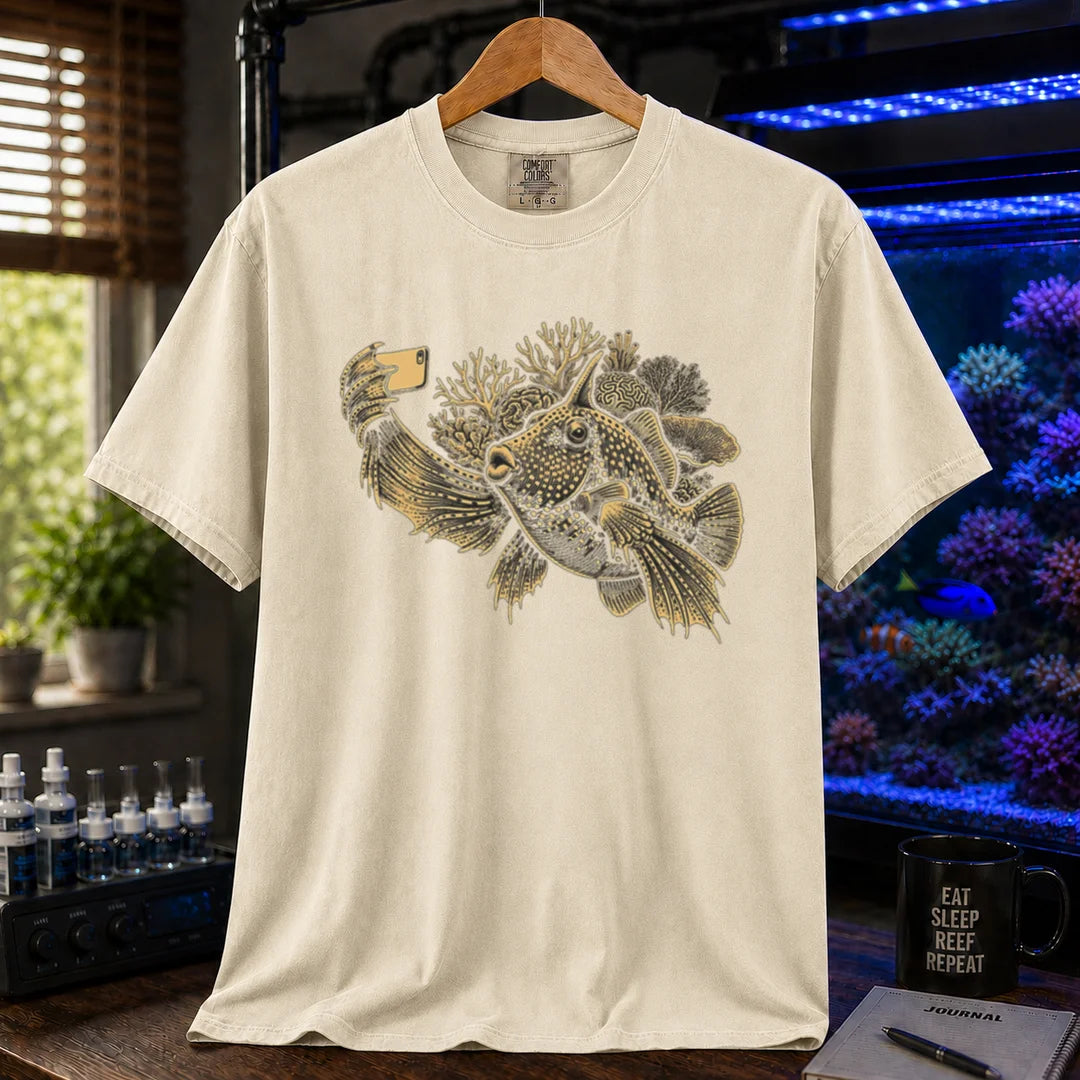 Saltwater aquarium graphic t-shirt featuring a fish taking a selfie illustration with corals, cream, beige, ivory crew neck tee