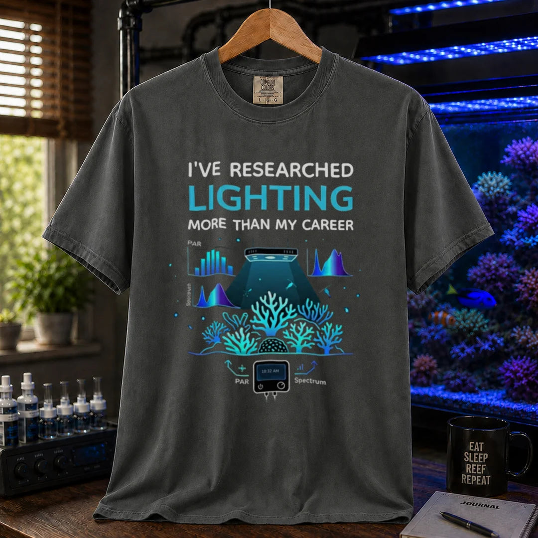 Saltwater aquarium graphic t-shirt featuring lighting and PAR graphs with text: I'VE RESEARCHED LIGHTING MORE THAN MY CAREER, dark grey crew neck tee