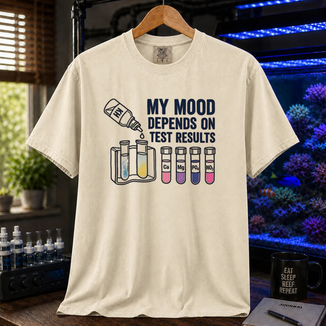 Saltwater aquarium graphic t-shirt featuring test kit and tube illustrations with text: MY MOOD DEPENDS ON TEST RESULTS, cream, beige, ivory crew neck tee