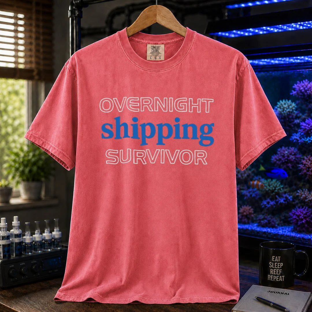 Saltwater aquarium graphic t-shirt featuring outline and solid text: OVERNIGHT shipping SURVIVOR, light red crew neck tee