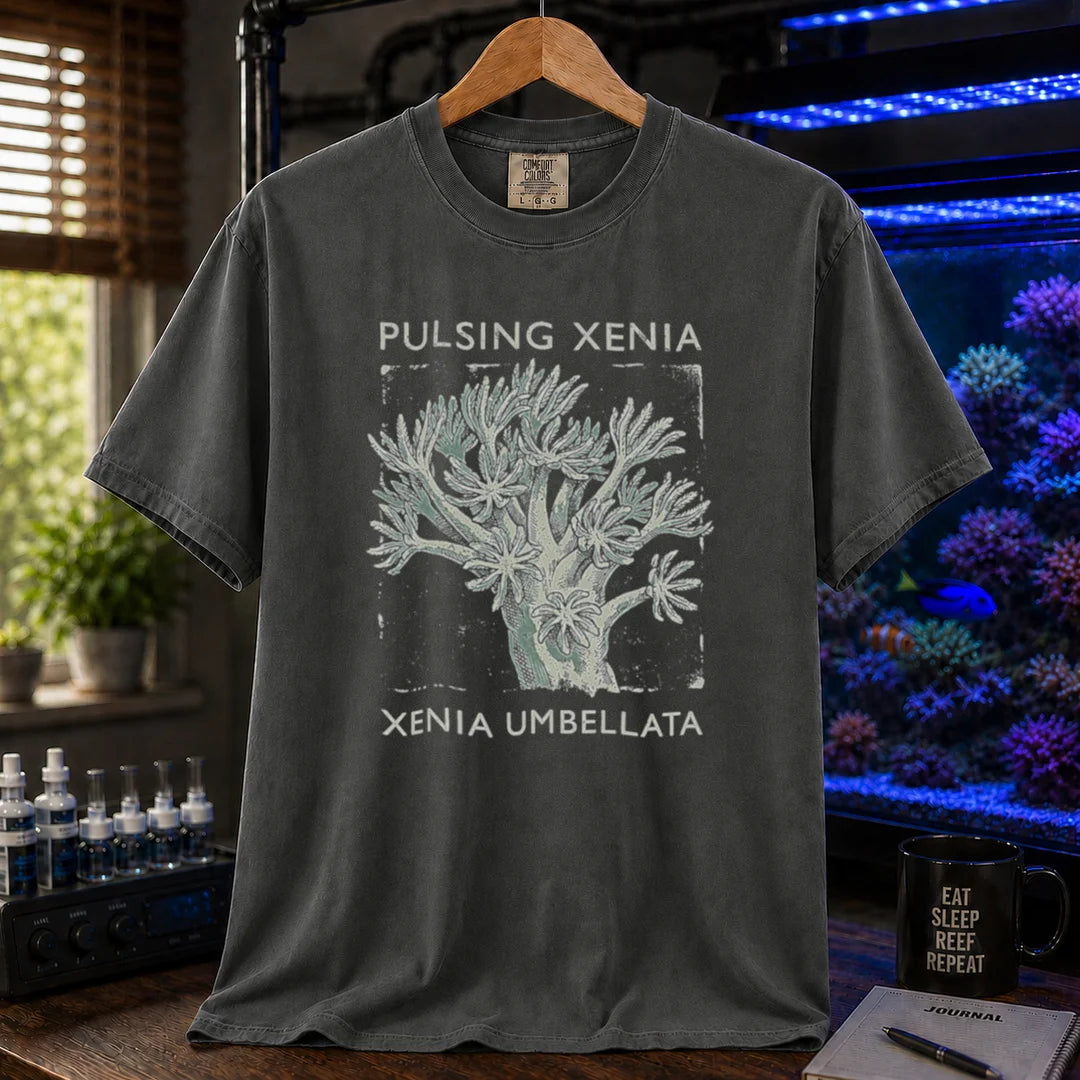 Saltwater aquarium graphic t-shirt featuring a Pulsing Xenia coral illustration with text: PULSING XENIA XENIA UMBELLATA, dark grey crew neck tee