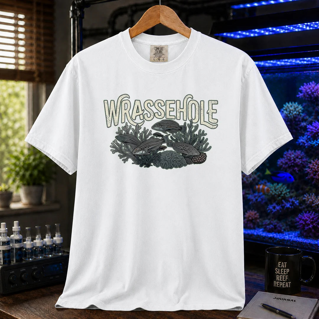Saltwater aquarium graphic t-shirt featuring a wrasse fish reef illustration with text: WRASSEHOLE, white crew neck tee