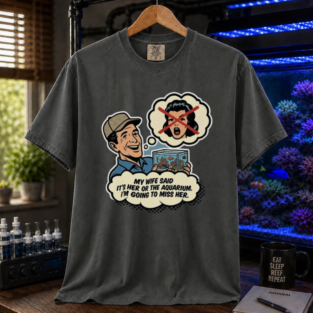 Saltwater aquarium graphic t-shirt featuring a retro comic illustration and text: MY WIFE SAID IT'S HER OR THE AQUARIUM. I'M GOING TO MISS HER., dark grey crew neck tee