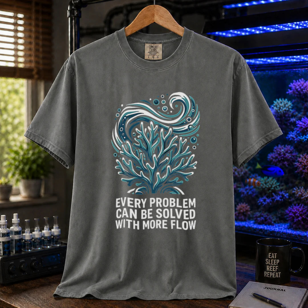Saltwater aquarium graphic t-shirt featuring a swirling water current and coral illustration with text: EVERY PROBLEM CAN BE SOLVED WITH MORE FLOW, dark grey crew neck tee