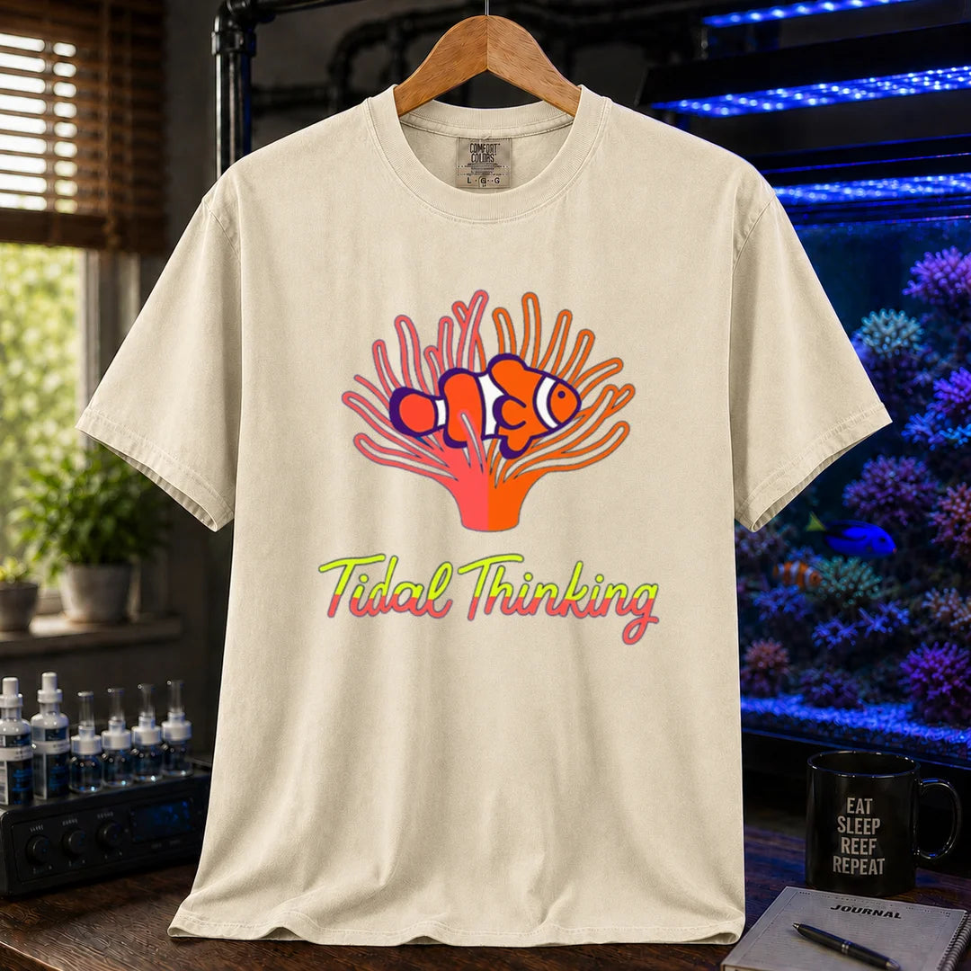 Saltwater aquarium graphic t-shirt featuring a clownfish in an anemone and cursive text: Tidal Thinking, cream, beige, ivory crew neck tee