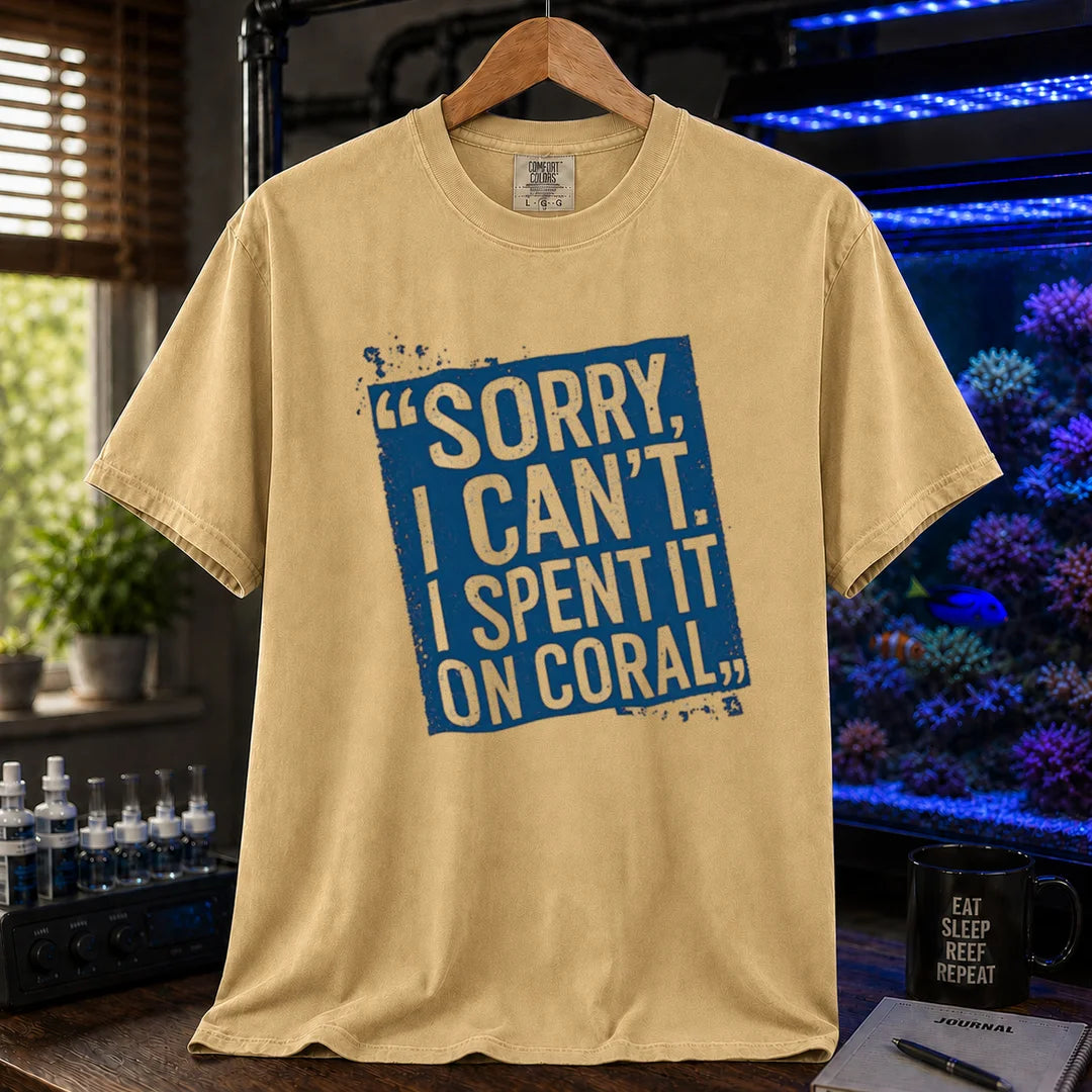Saltwater aquarium graphic t-shirt featuring a distressed blue stamp graphic with white text reading Sorry, I Can't. I Spent It On Coral., mustard crew neck tee