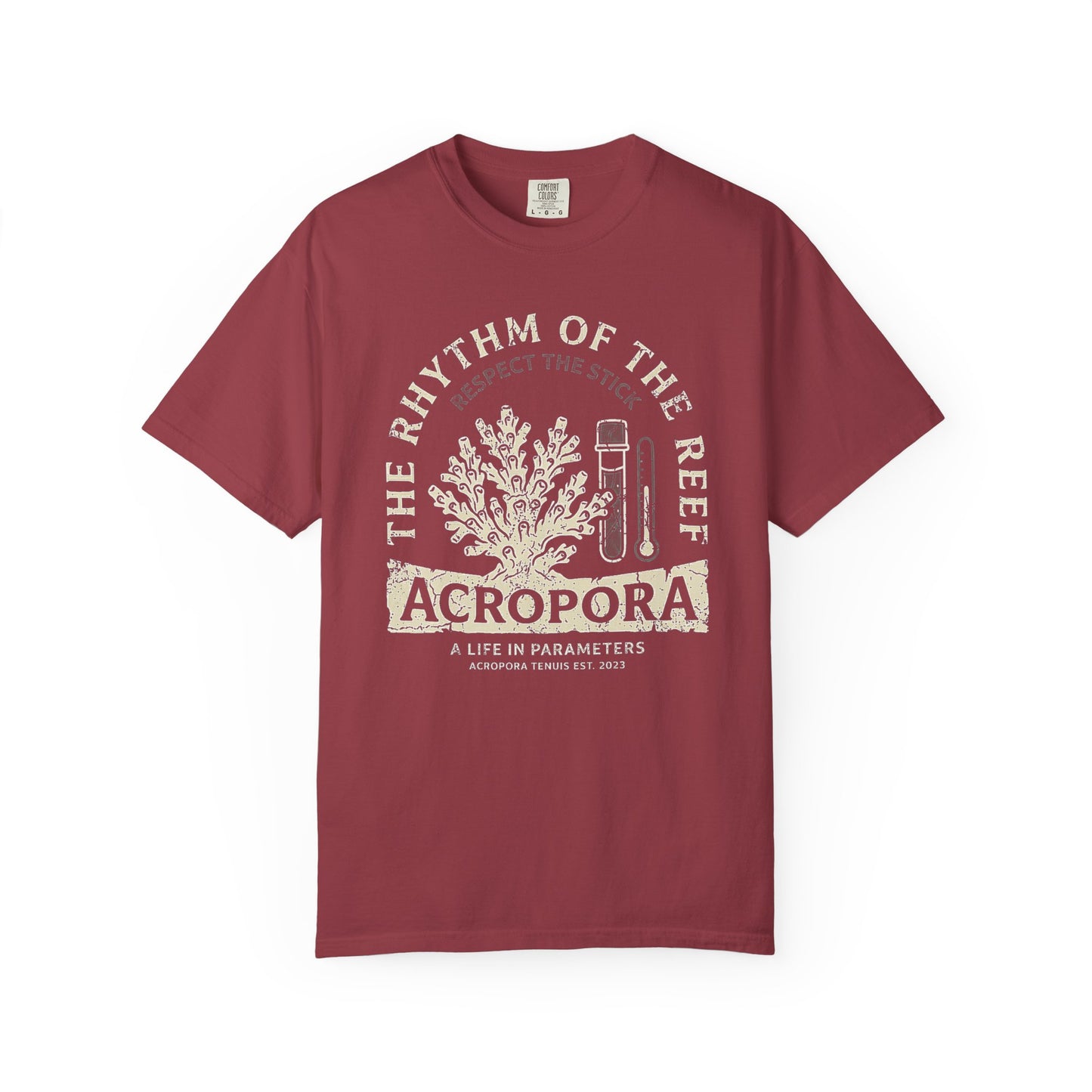 Broke Reefers graphic t-shirt featuring an illustration of an Acropora coral colony and testing tools with the text: THE RHYTHM OF THE REEF, ACROPORA, A LIFE IN PARAMETERS, maroon crew neck tee