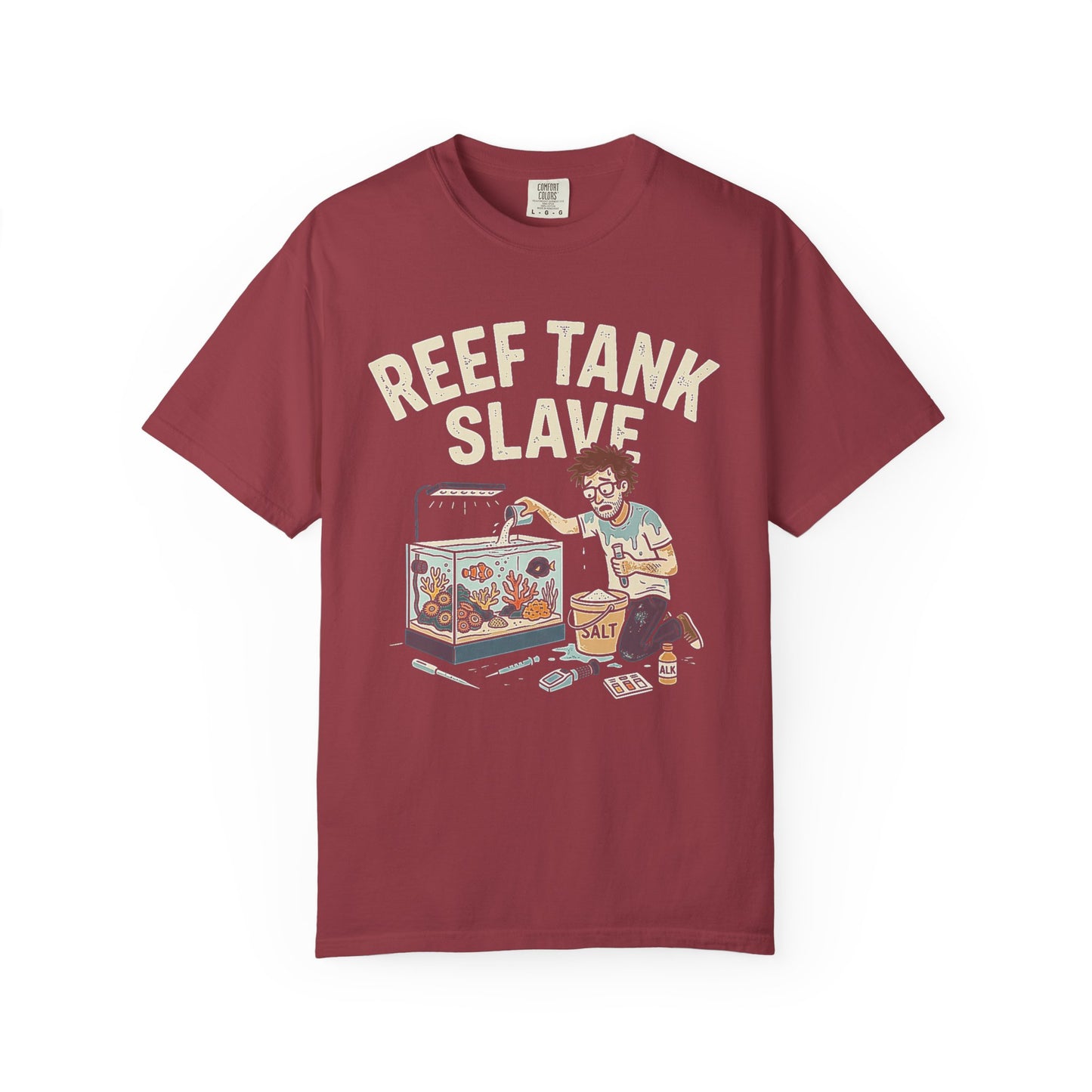 Broke Reefers saltwater aquarium graphic t-shirt featuring a detailed illustration of a reef-keeper mixing salt and maintaining a reef tank with the text: REEF TANK SLAVE, maroon crew neck tee