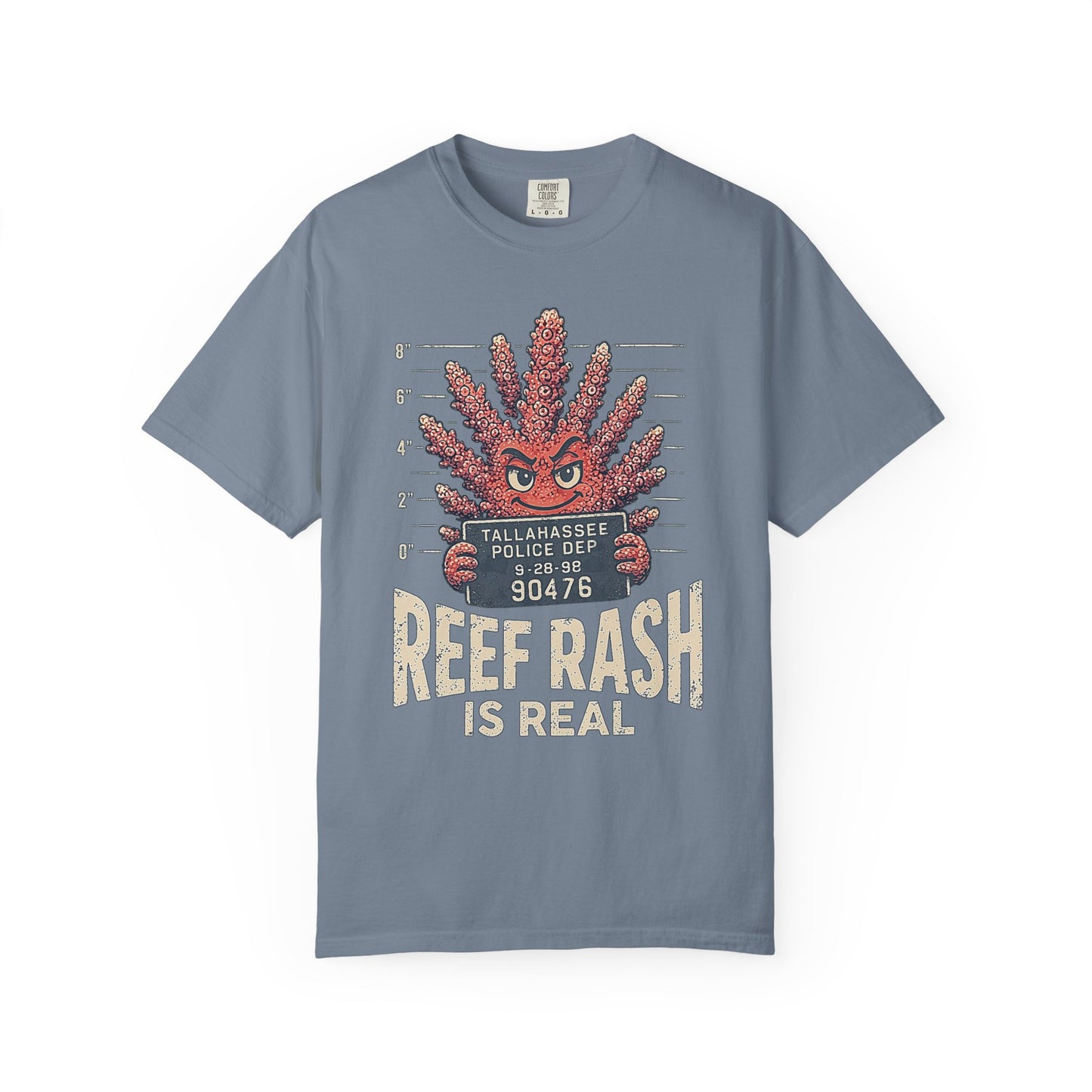 Broke Reefers graphic t-shirt featuring an illustration of a coral character in a police mugshot pose with the text: TALLAHASSEE POLICE DEP, REEF RASH IS REAL, blue crew neck tee