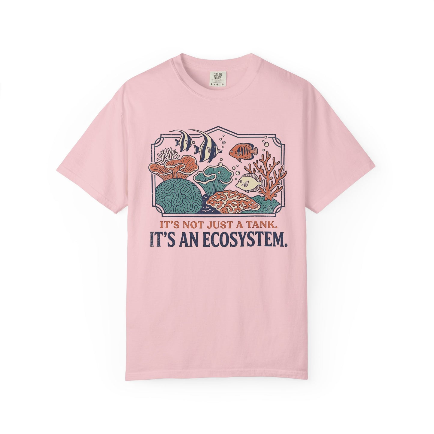 Broke Reefers saltwater aquarium graphic t-shirt featuring a detailed, vintage-style illustration of a thriving reef ecosystem with the text: IT'S NOT JUST A TANK. IT'S AN ECOSYSTEM., pink crew neck tee