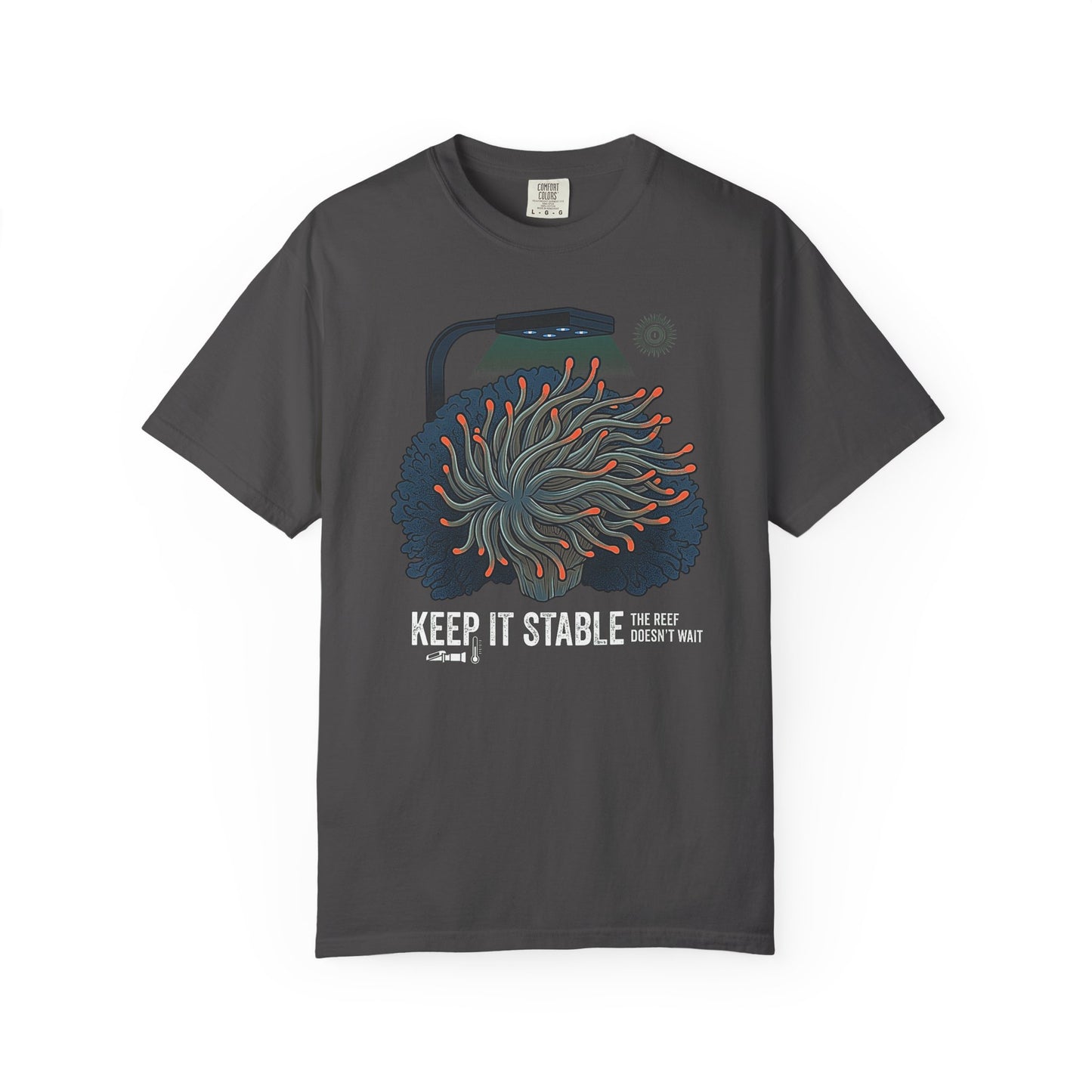 Broke Reefers graphic t-shirt featuring an illustration of an anemone under aquarium lighting with icons for a refractometer and thermometer, and the text: KEEP IT STABLE THE REEF DOESN'T WAIT, dark khaki crew neck tee