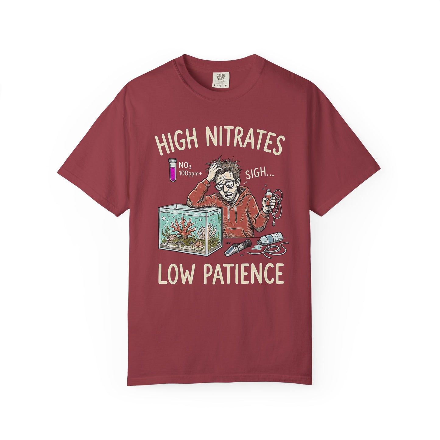 Broke Reefers saltwater aquarium graphic t-shirt featuring a detailed illustration of an overwhelmed reef-keeper testing their tank water with the text: HIGH NITRATES, LOW PATIENCE, maroon crew neck tee