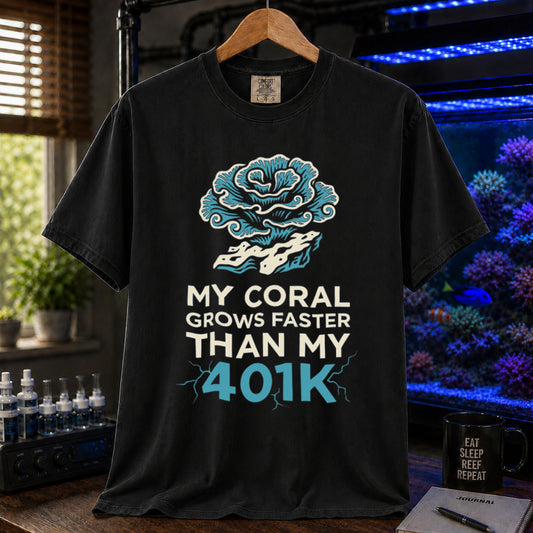 Broke Reefers saltwater aquarium graphic t-shirt featuring an intricate coral illustration and electric blue and white text: MY CORAL GROWS FASTER THAN MY 401K, Black crew neck tee