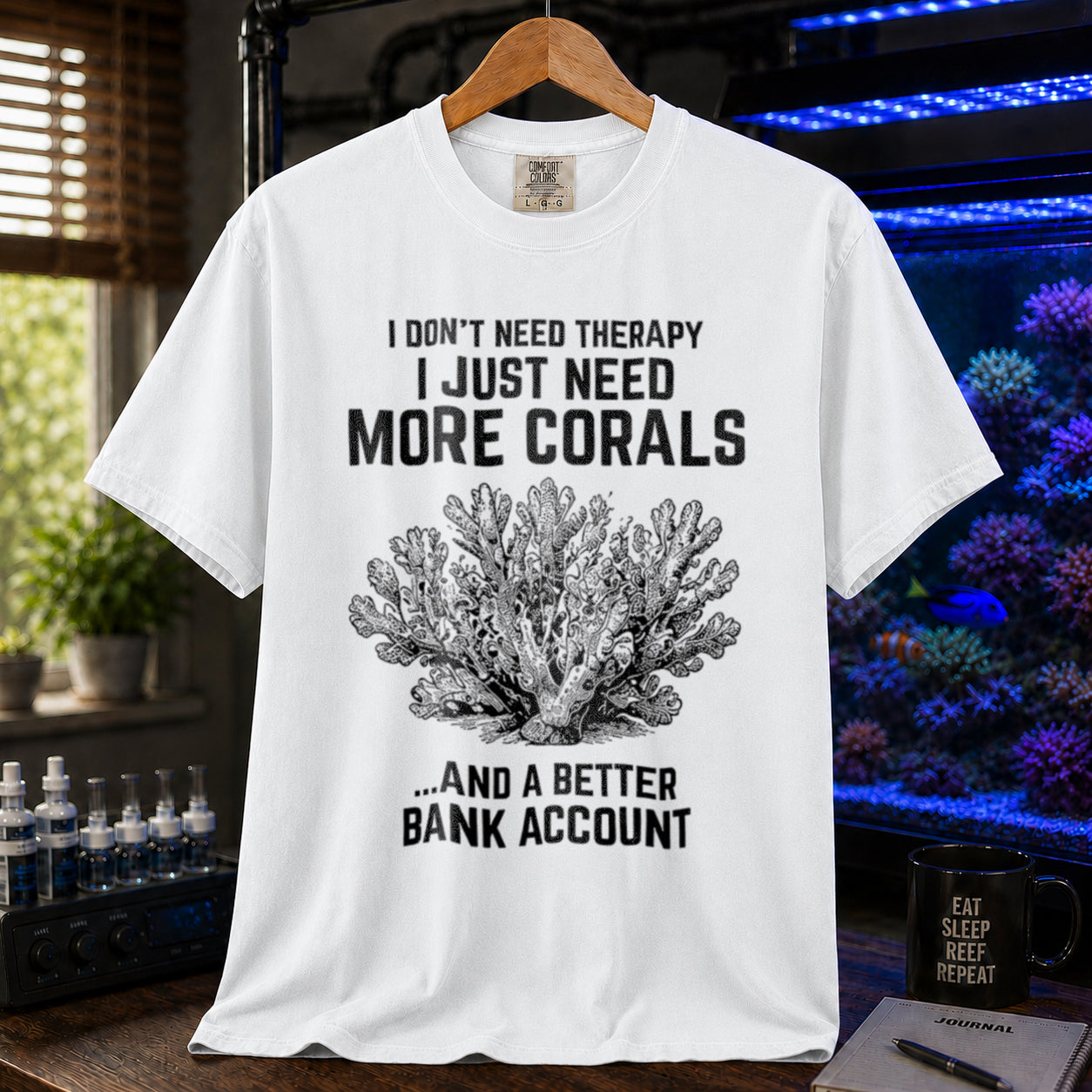 Broke Reefers saltwater aquarium graphic t-shirt featuring an intricate vintage coral illustration and bold text: I DON'T NEED THERAPY I JUST NEED MORE CORALS ...AND A BETTER BANK ACCOUNT, white crew neck tee