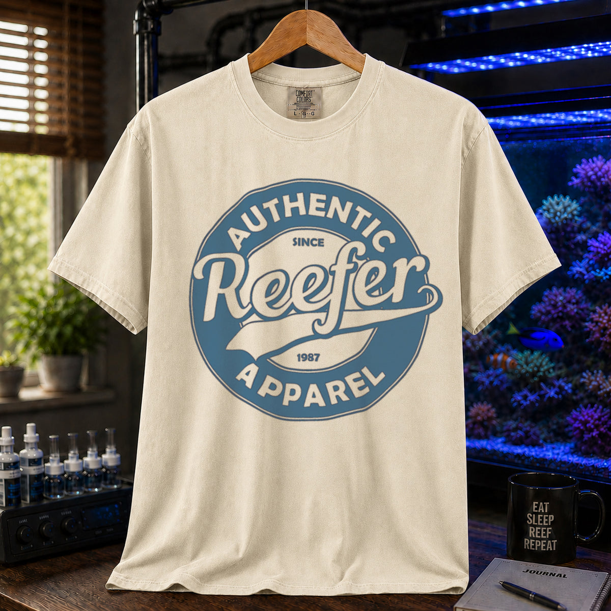 Saltwater aquarium graphic t-shirt featuring a retro circular athletic seal and text: AUTHENTIC, SINCE 1987, Reefer, APPAREL, cream, beige, ivory crew neck tee