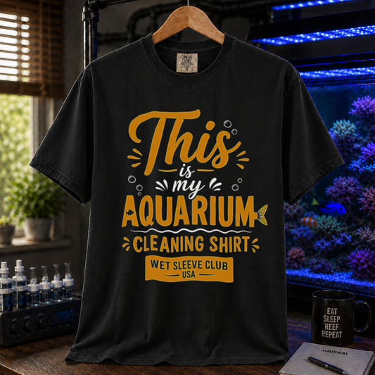 Saltwater aquarium graphic t-shirt featuring bold gold and white text: THIS IS MY AQUARIUM CLEANING SHIRT, WET SLEEVE CLUB USA, black crew neck tee