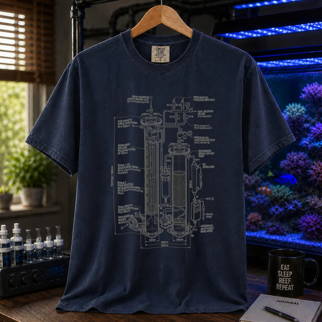 Saltwater aquarium graphic t-shirt featuring a technical engineering blueprint of a dual-stage calcium reactor with detailed labels and measurements, navy crew neck tee