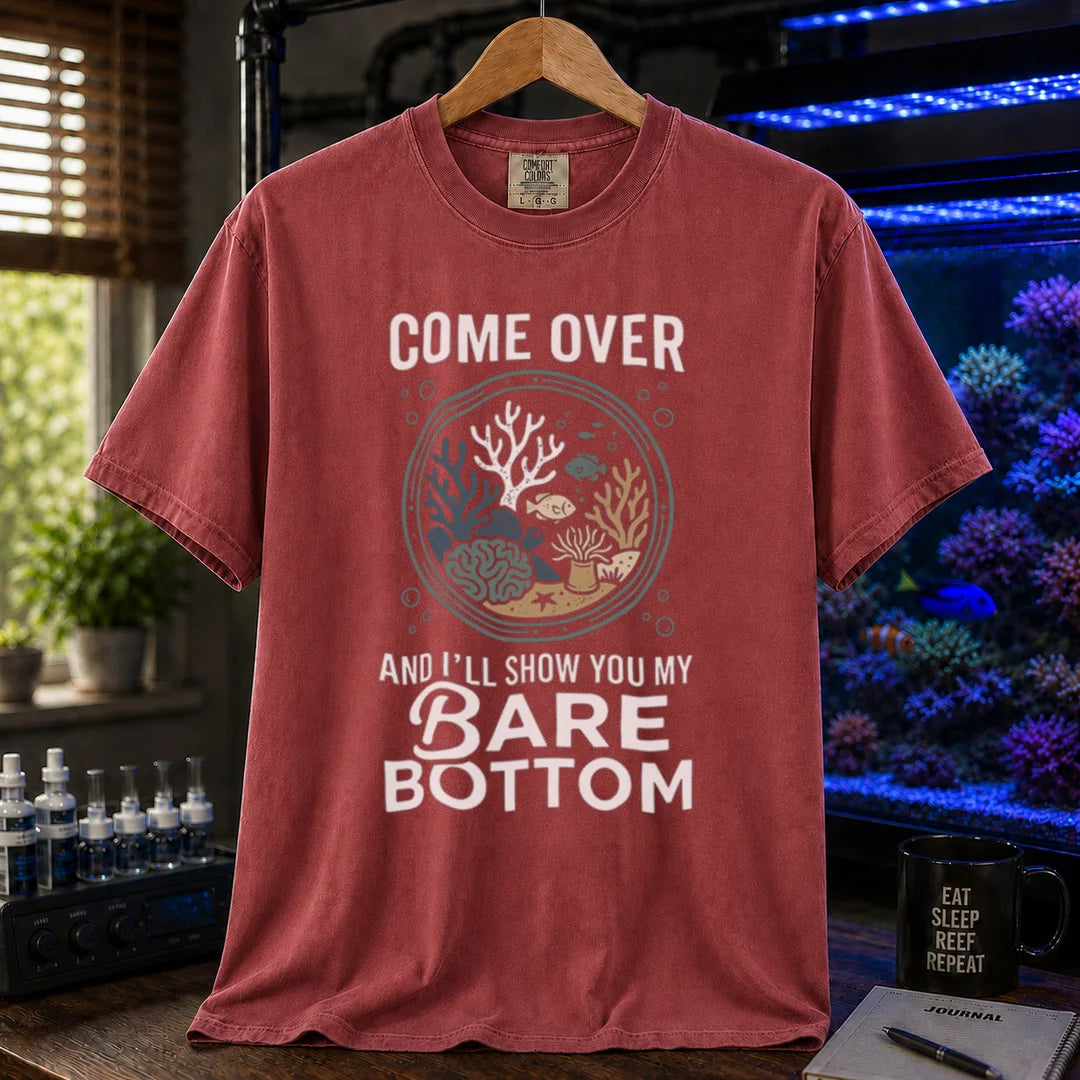 Saltwater aquarium graphic t-shirt featuring a top-down reef tank illustration and text: COME OVER AND I'LL SHOW YOU MY BARE BOTTOM, maroon crew neck tee
