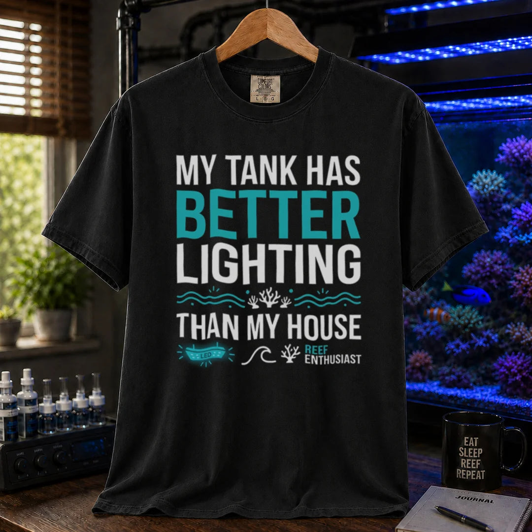 Saltwater aquarium graphic t-shirt featuring bold typography and reef icons with the text: MY TANK HAS BETTER LIGHTING THAN MY HOUSE,  black crew neck tee