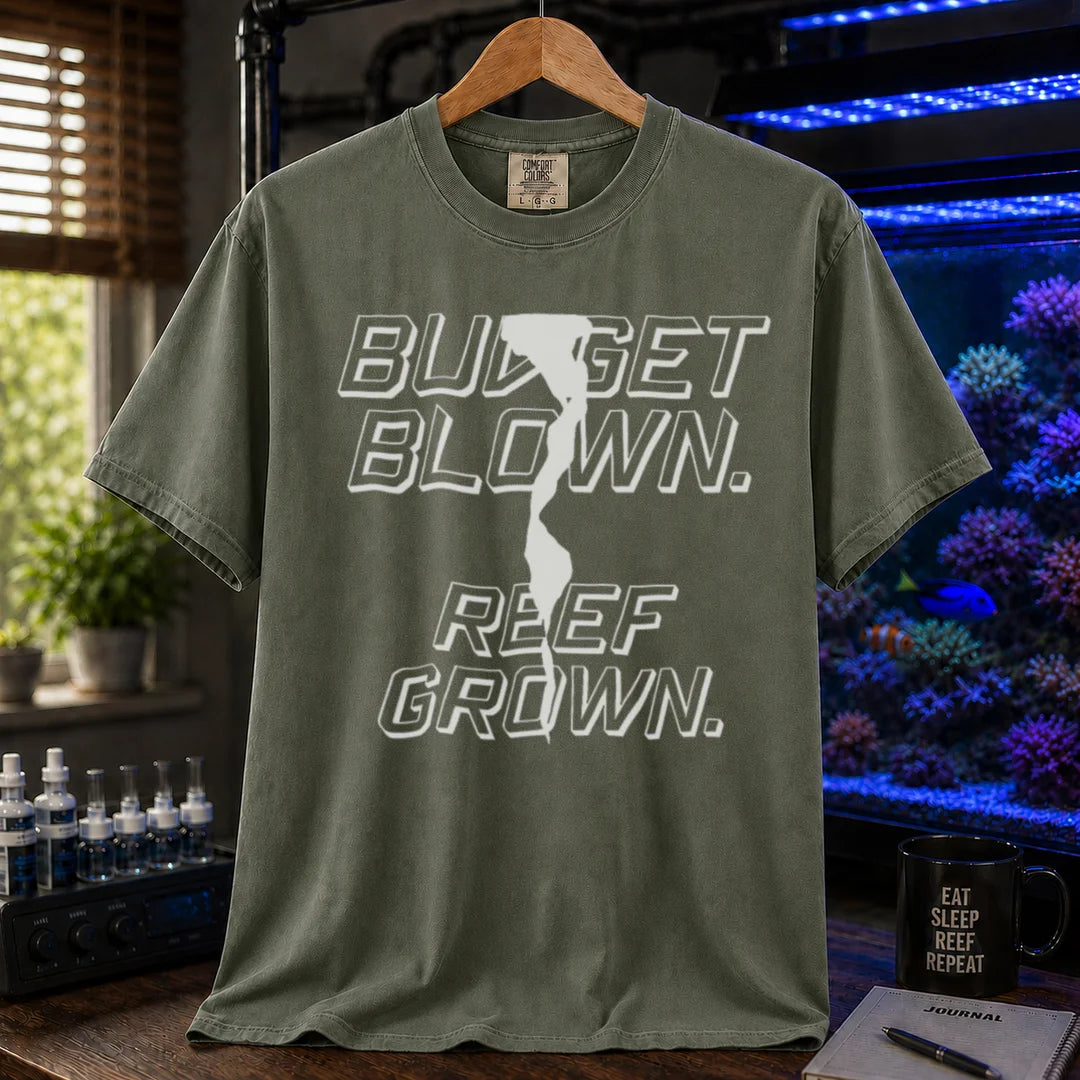 Saltwater aquarium graphic t-shirt featuring bold retro outline typography with the text: BUDGET BLOWN. REEF GROWN., khaki crew neck tee