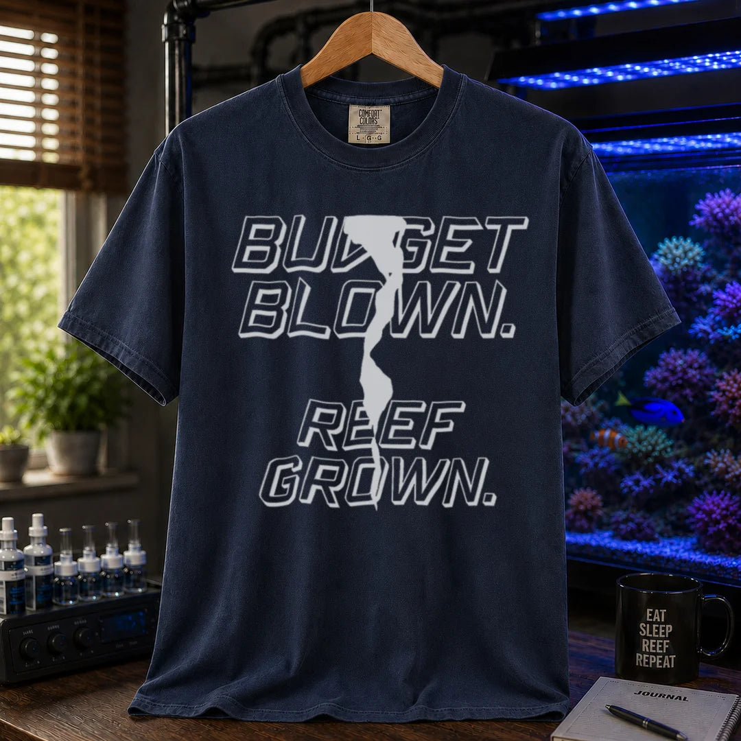 Saltwater aquarium graphic t-shirt featuring bold retro outline typography with the text: BUDGET BLOWN. REEF GROWN., navy crew neck tee
