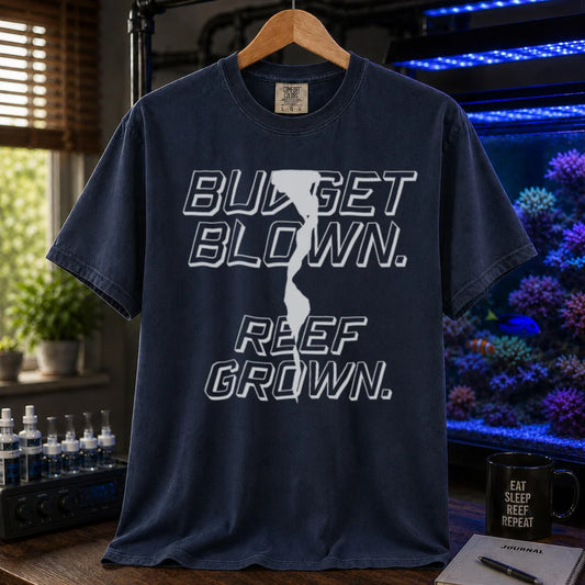 Saltwater aquarium graphic t-shirt featuring bold retro outline typography with the text: BUDGET BLOWN. REEF GROWN., navy crew neck tee