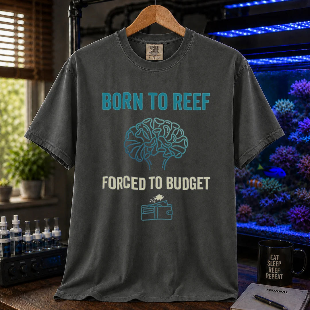 Saltwater aquarium graphic t-shirt featuring brain coral art, a wallet icon, and text: BORN TO REEF, FORCED TO BUDGET, khaki crew neck tee
