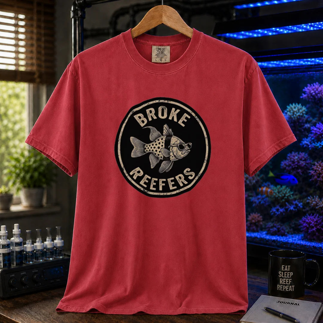 Saltwater aquarium graphic t-shirt featuring the circular Broke Reefers vintage logo with a bespectacled fish illustration, red crew neck tee
