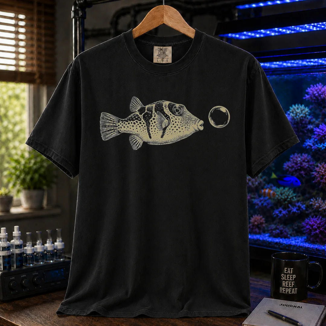 Saltwater aquarium graphic t-shirt featuring a vintage illustration of a Valentini Puffer blowing a bubble, black crew neck tee
