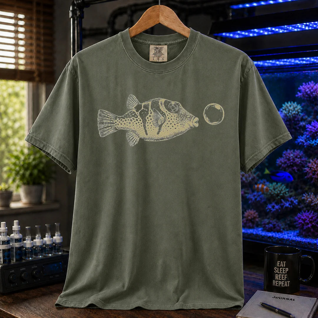 Saltwater aquarium graphic t-shirt featuring a vintage illustration of a Valentini Puffer blowing a bubble, military green crew neck tee