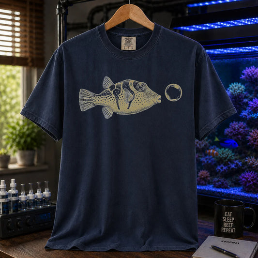 Saltwater aquarium graphic t-shirt featuring a vintage illustration of a Valentini Puffer blowing a bubble, navy crew neck tee