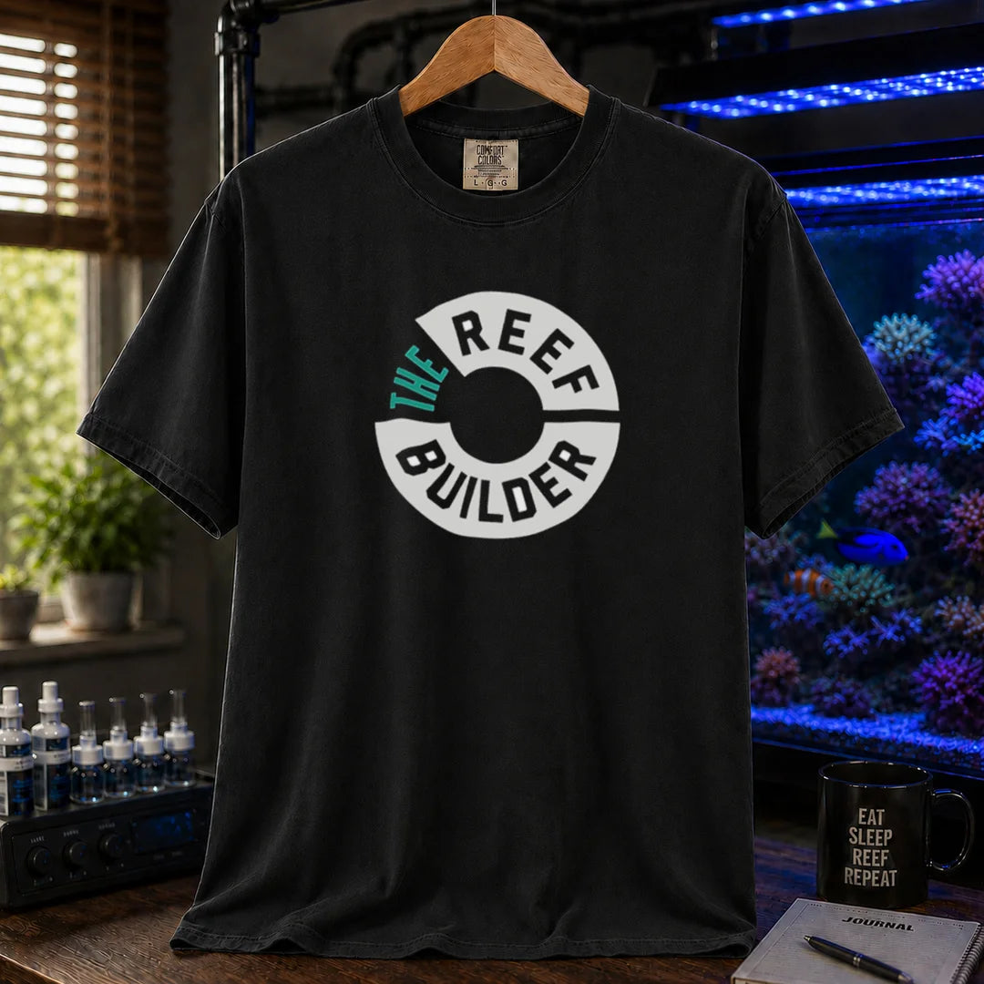 Saltwater aquarium graphic t-shirt featuring a circular badge with teal and white text reading: THE REEF BUILDER, black crew neck tee