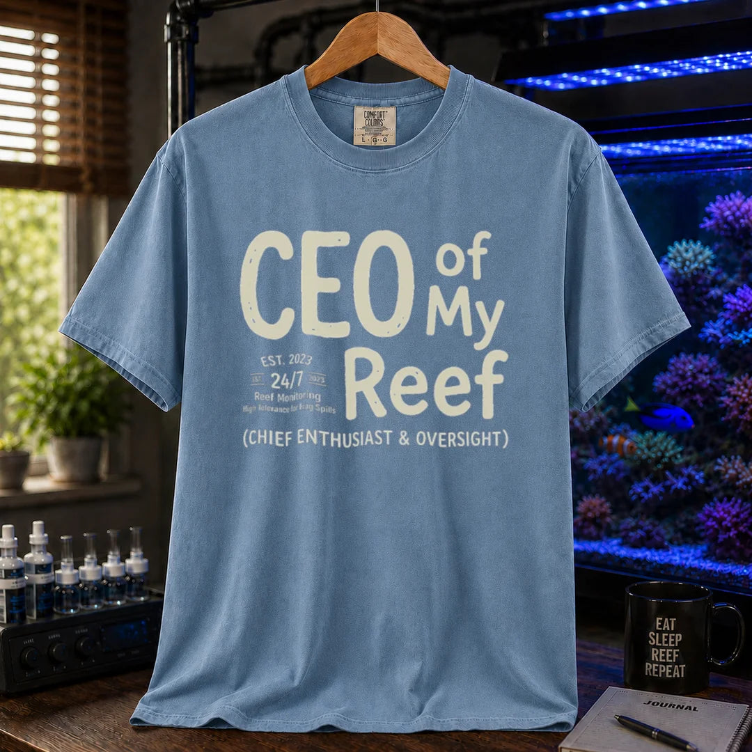 Saltwater aquarium graphic t-shirt featuring bold text reading CEO of My Reef and executive hobby details, blue crew neck tee