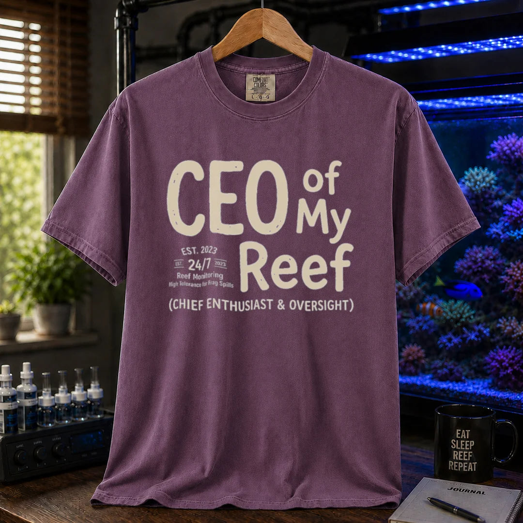 Saltwater aquarium graphic t-shirt featuring bold text reading CEO of My Reef and executive hobby details, purple crew neck tee