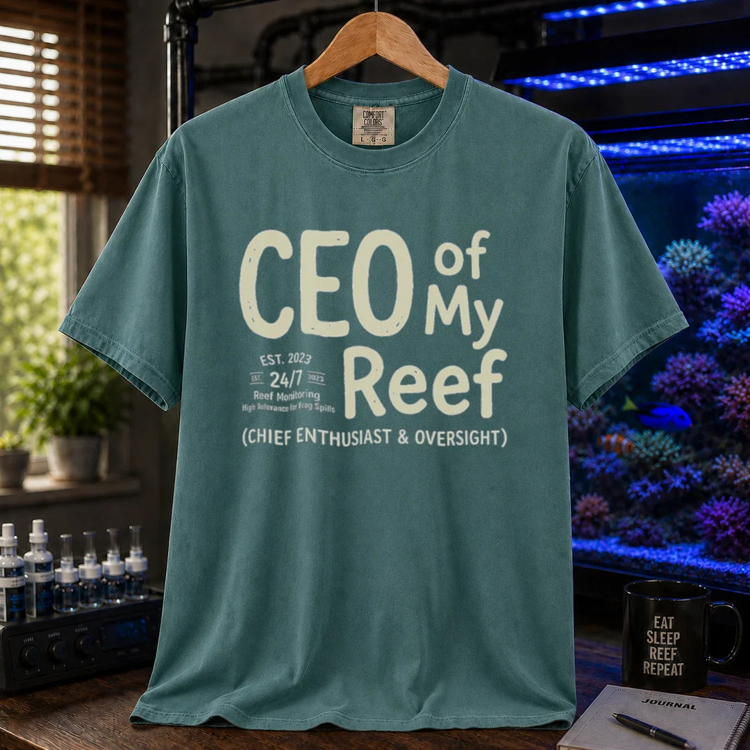 Saltwater aquarium graphic t-shirt featuring bold text reading CEO of My Reef and executive hobby details, green crew neck tee