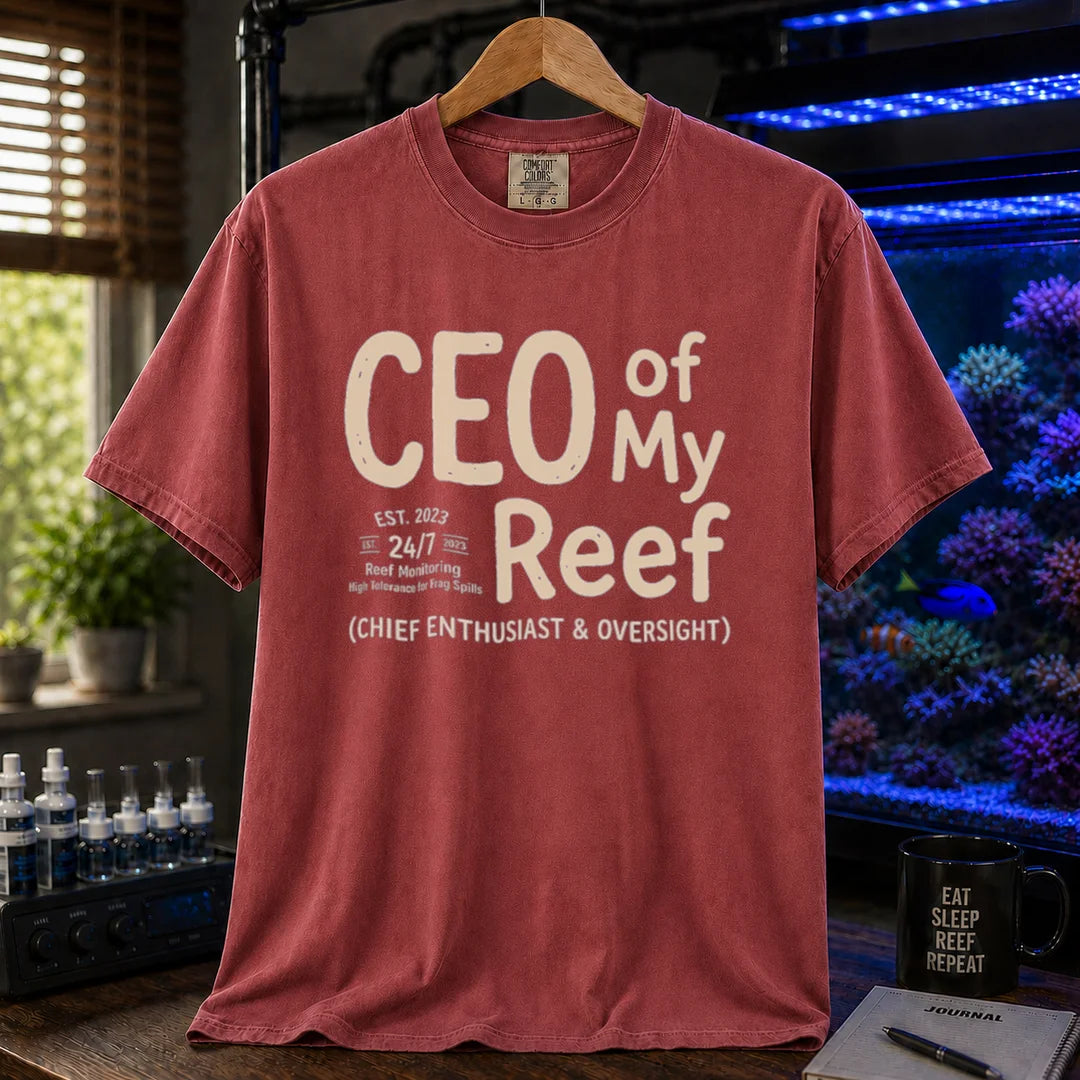 Saltwater aquarium graphic t-shirt featuring bold text reading CEO of My Reef and executive hobby details, maroon crew neck tee