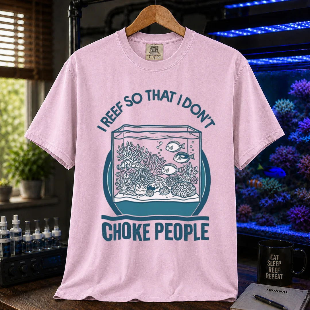 Saltwater aquarium graphic t-shirt featuring an aquarium illustration and text: I REEF SO THAT I DON'T CHOKE PEOPLE, pink crew neck tee