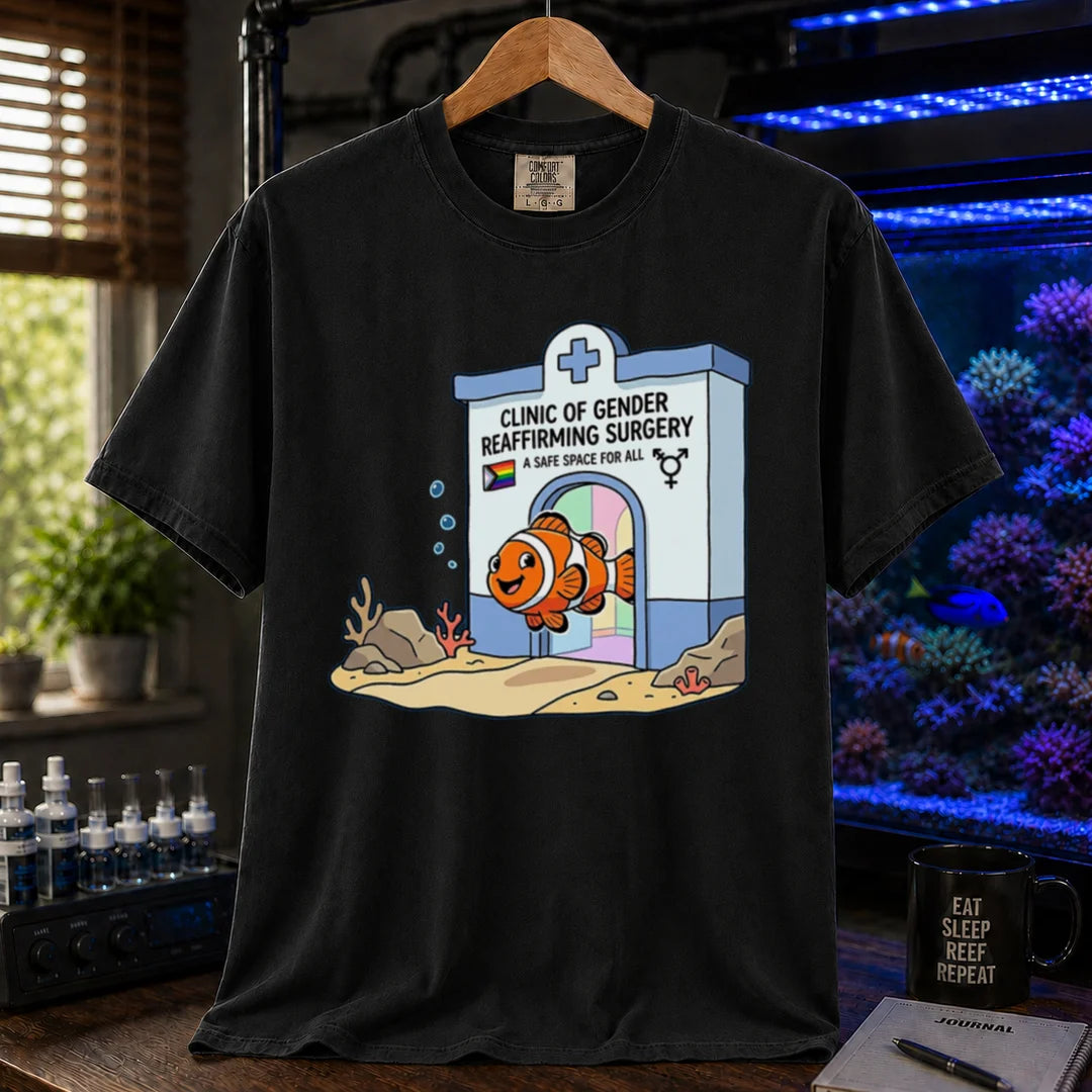 Saltwater aquarium graphic t-shirt featuring a clownfish coming out of a clinic for gender-affirming surgery, black crew neck tee
