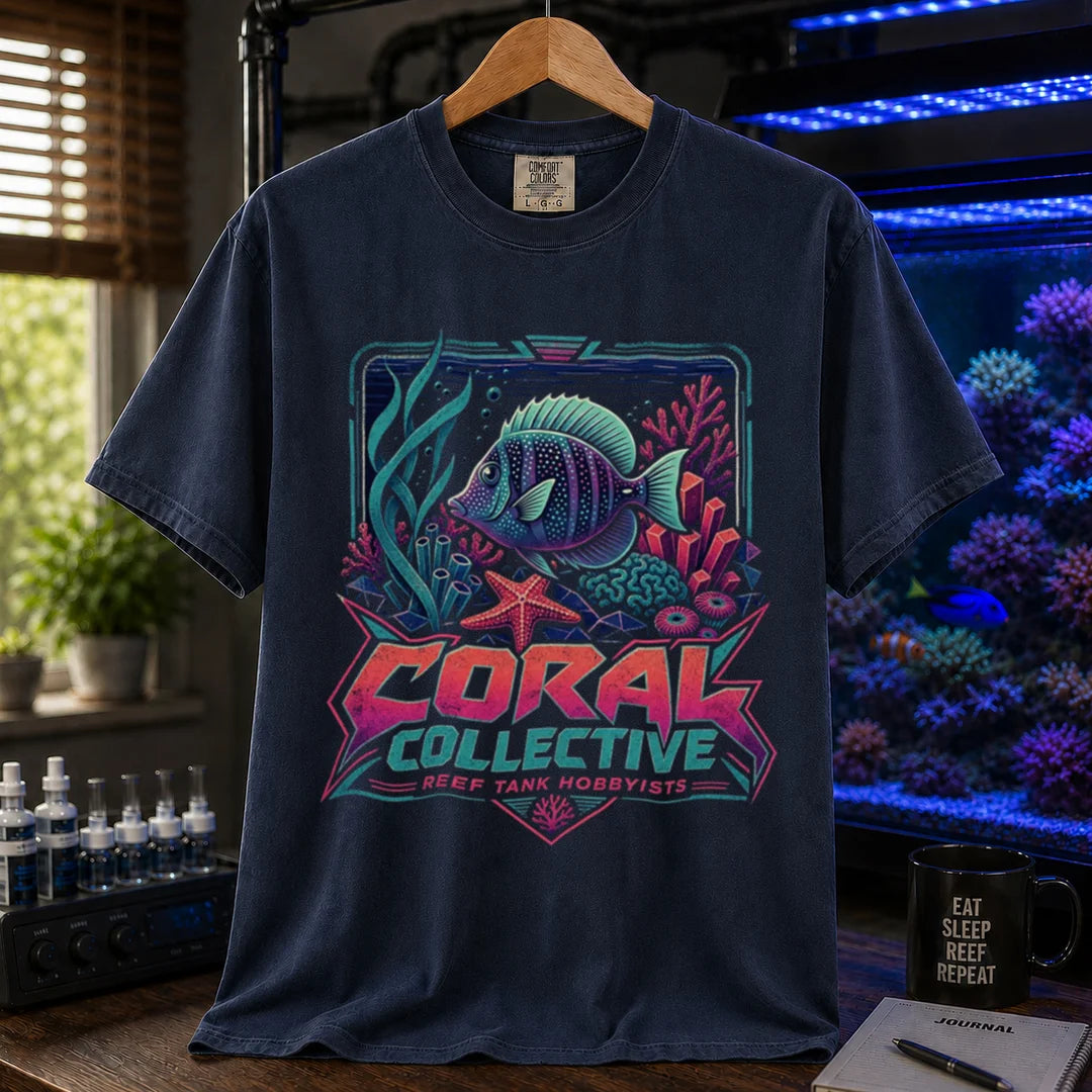 Saltwater aquarium graphic t-shirt featuring a vibrant retro-styled coral reef illustration and text: CORAL COLLECTIVE REEF TANK HOBBYISTS, navy crew neck tee