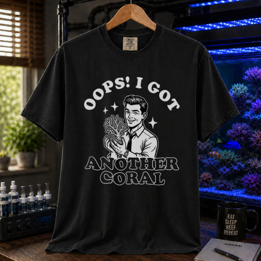 Saltwater aquarium graphic t-shirt featuring a retro illustration of a man holding a coral with text: OOPS! I GOT ANOTHER CORAL, black crew neck tee