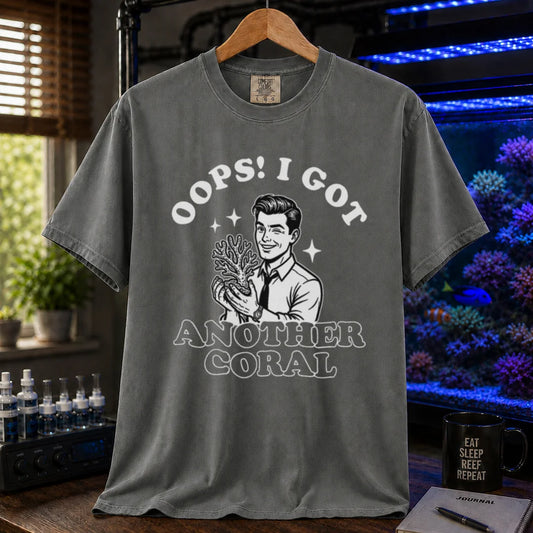 Saltwater aquarium graphic t-shirt featuring a retro illustration of a man holding a coral with text: OOPS! I GOT ANOTHER CORAL, khaki crew neck tee