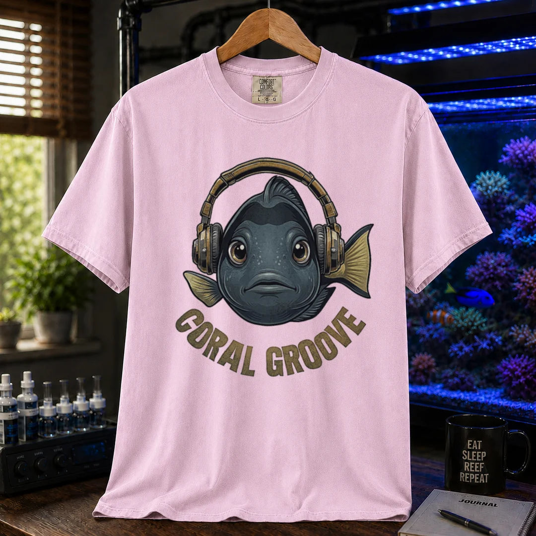 Saltwater aquarium graphic t-shirt featuring a fish wearing headphones and text: CORAL GROOVE, pink crew neck tee