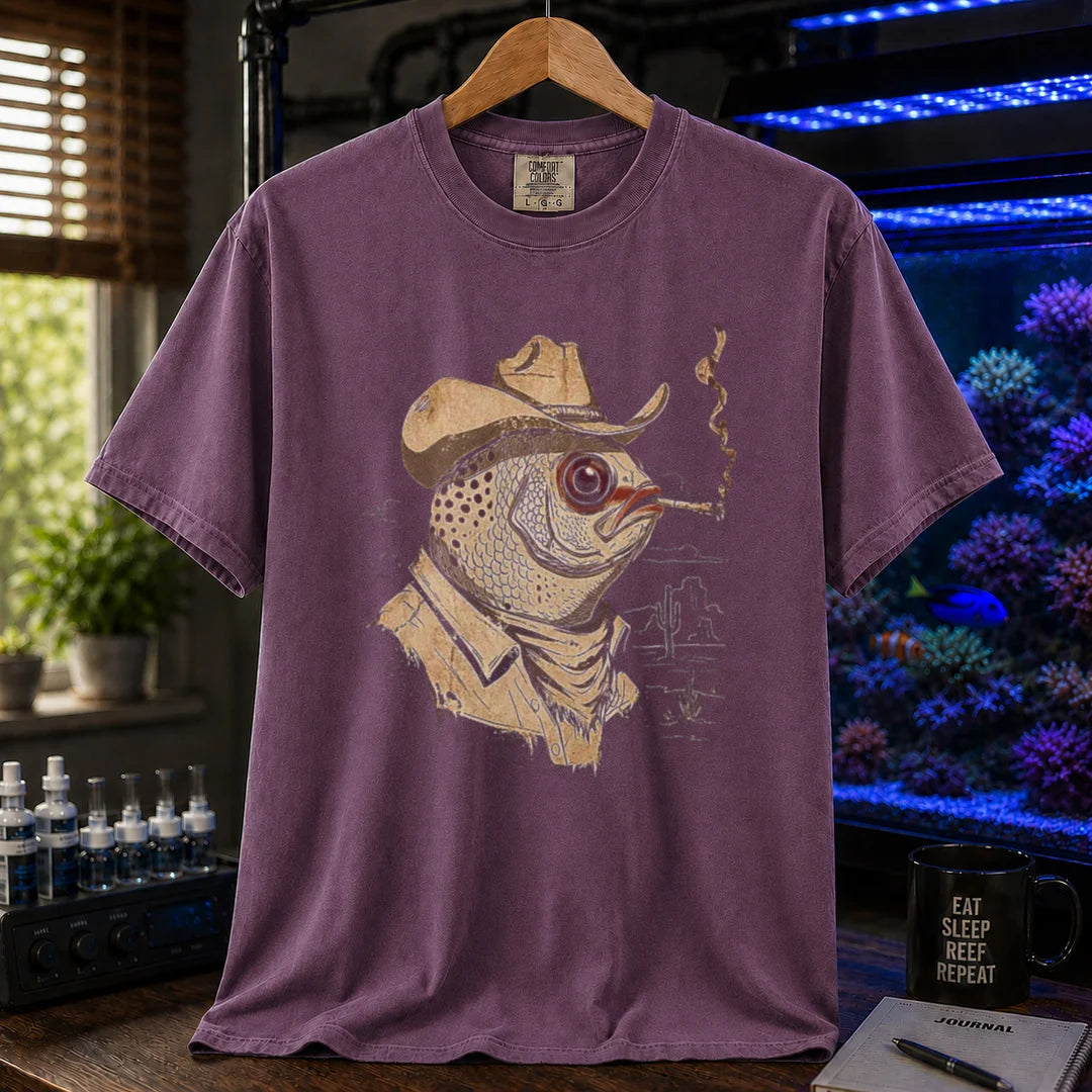 Saltwater aquarium graphic t-shirt featuring a vintage illustration of a fish in a cowboy hat smoking, purple crew neck tee