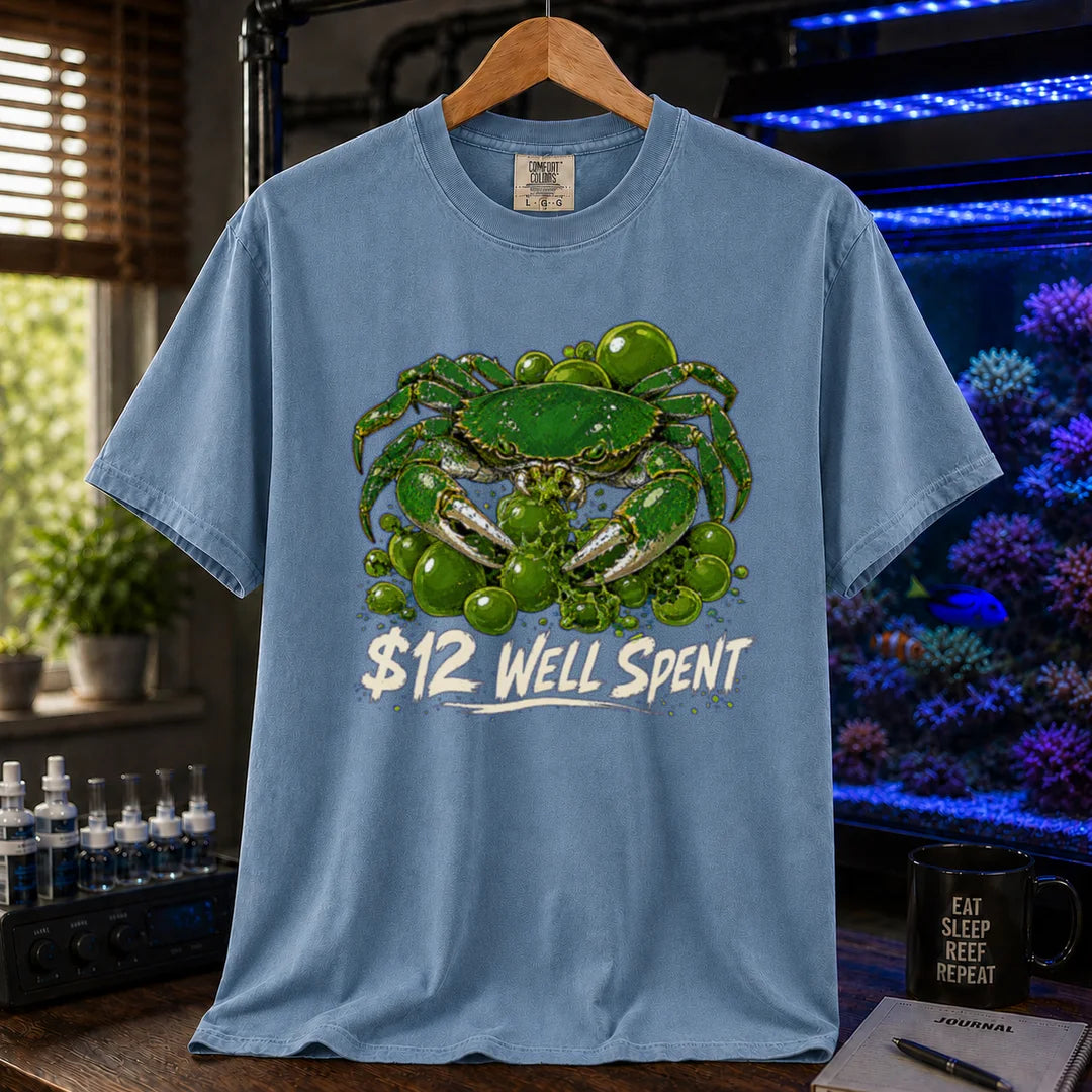 Saltwater aquarium graphic t-shirt featuring an illustration of an emerald crab with text: $12 WELL SPENT, blue crew neck tee