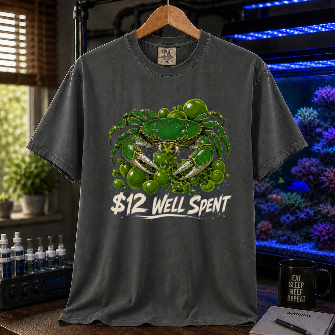 Saltwater aquarium graphic t-shirt featuring an illustration of an emerald crab with text: $12 WELL SPENT, khaki crew neck tee